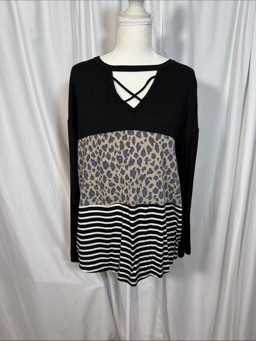 HEIMISH USA Black Mixed-Pattern Long Sleeve Top with Crisscross Neckline